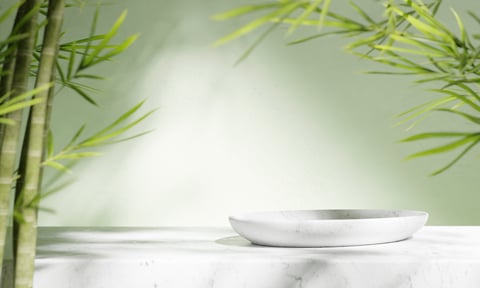 Self-care and wellness products on stone display